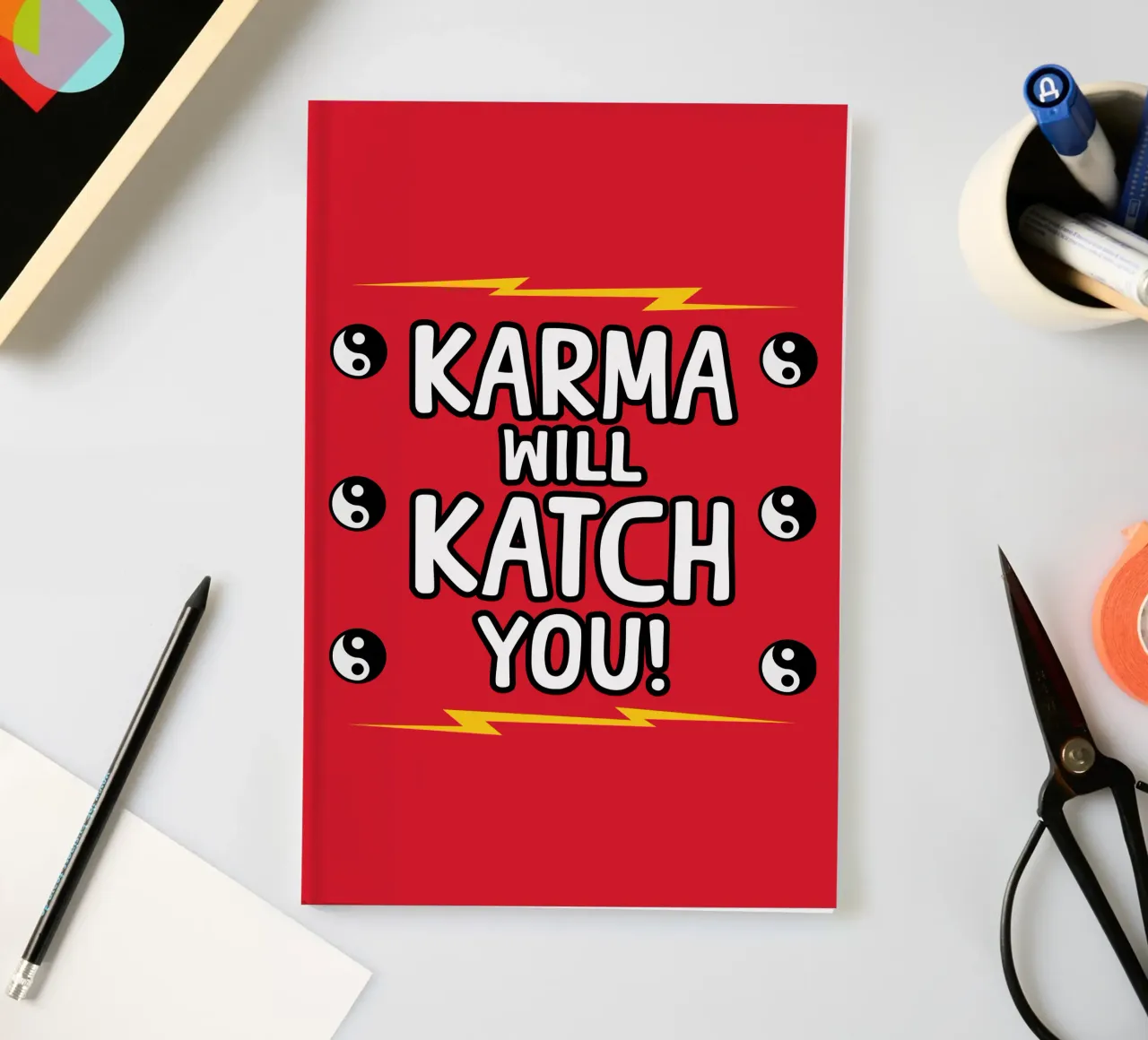 Karma Will Catch You notebook by sillyindustries