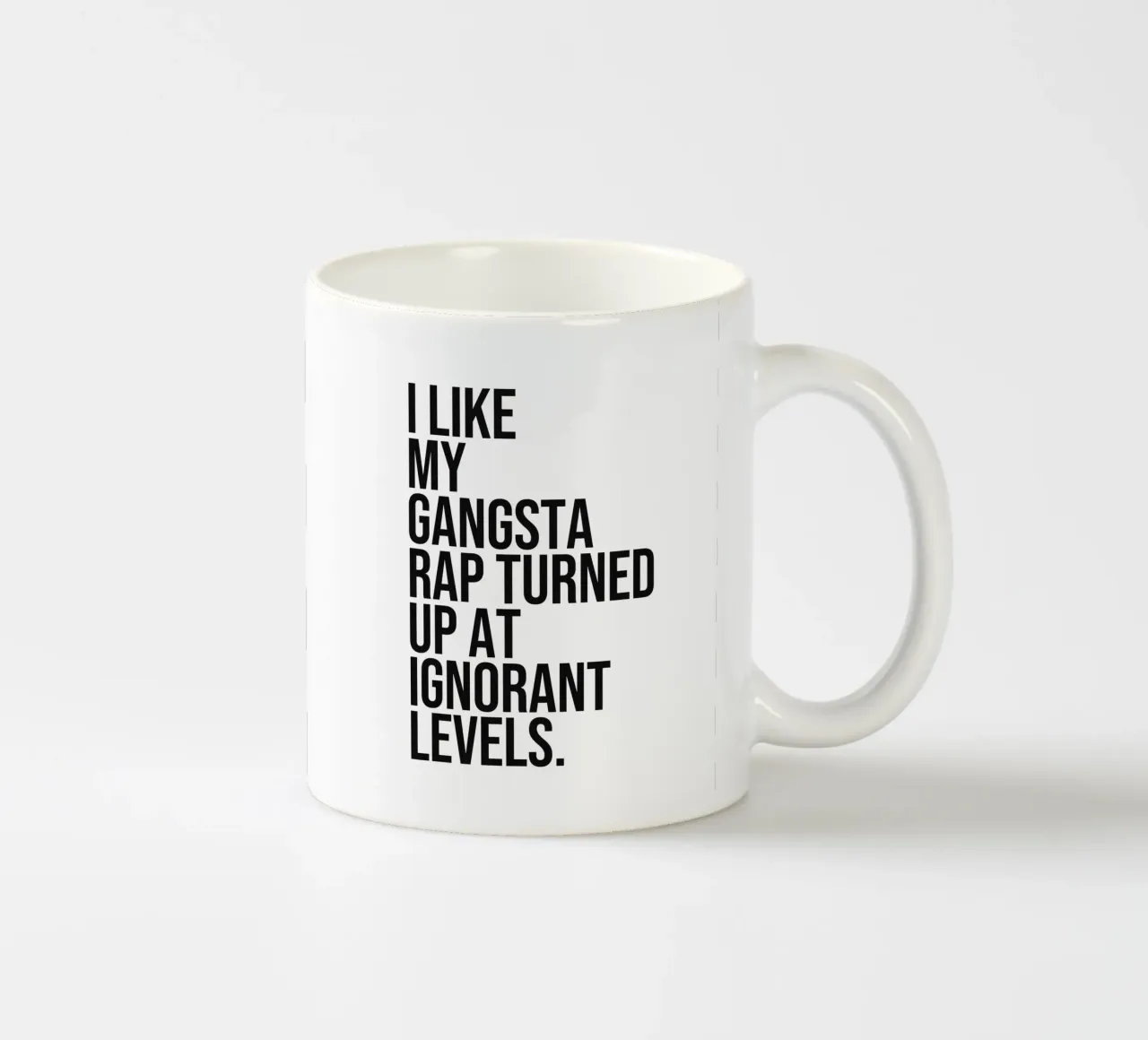 I like my gangsta rap turned up at ignorant levels quote ceramic mug by Paigaam Studio