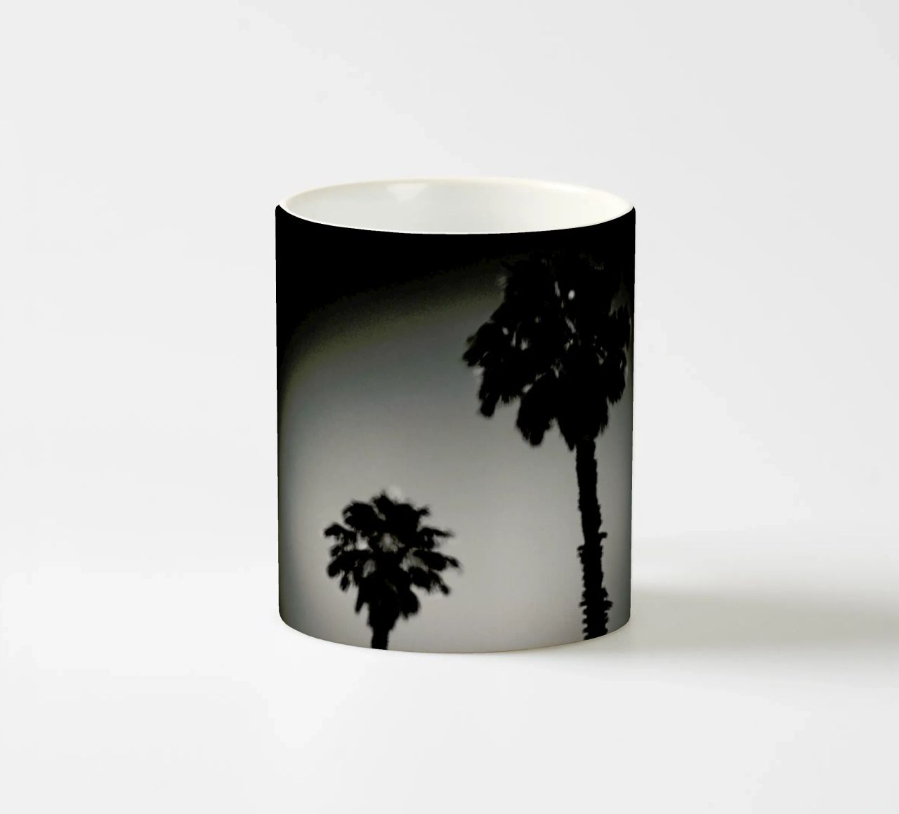 Why are palm trees so damn happy? tazza in ceramica da Tal Paz-Fridman