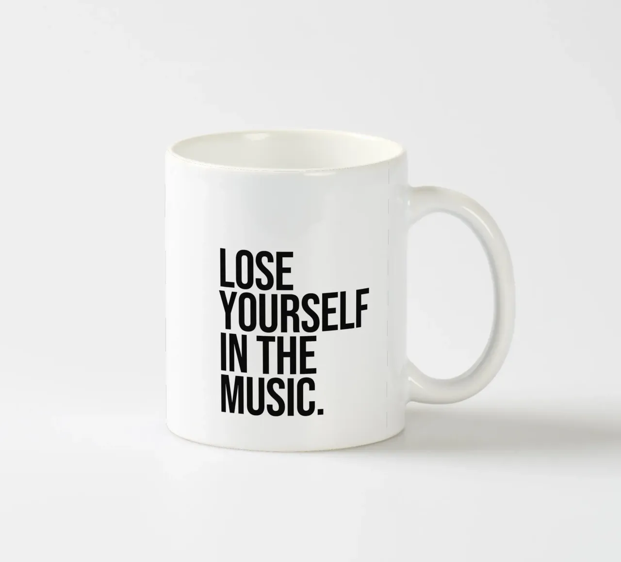 Lose Yourself In The Music Quote ceramic mug by Paigaam Studio