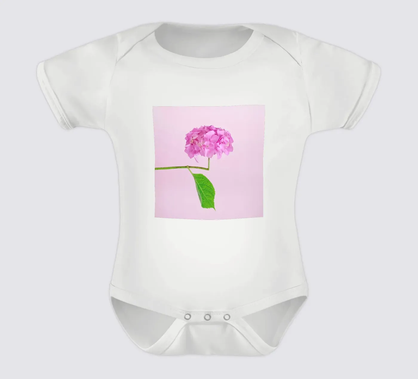 Adaptable short-sleeve baby romper by Juj Winn