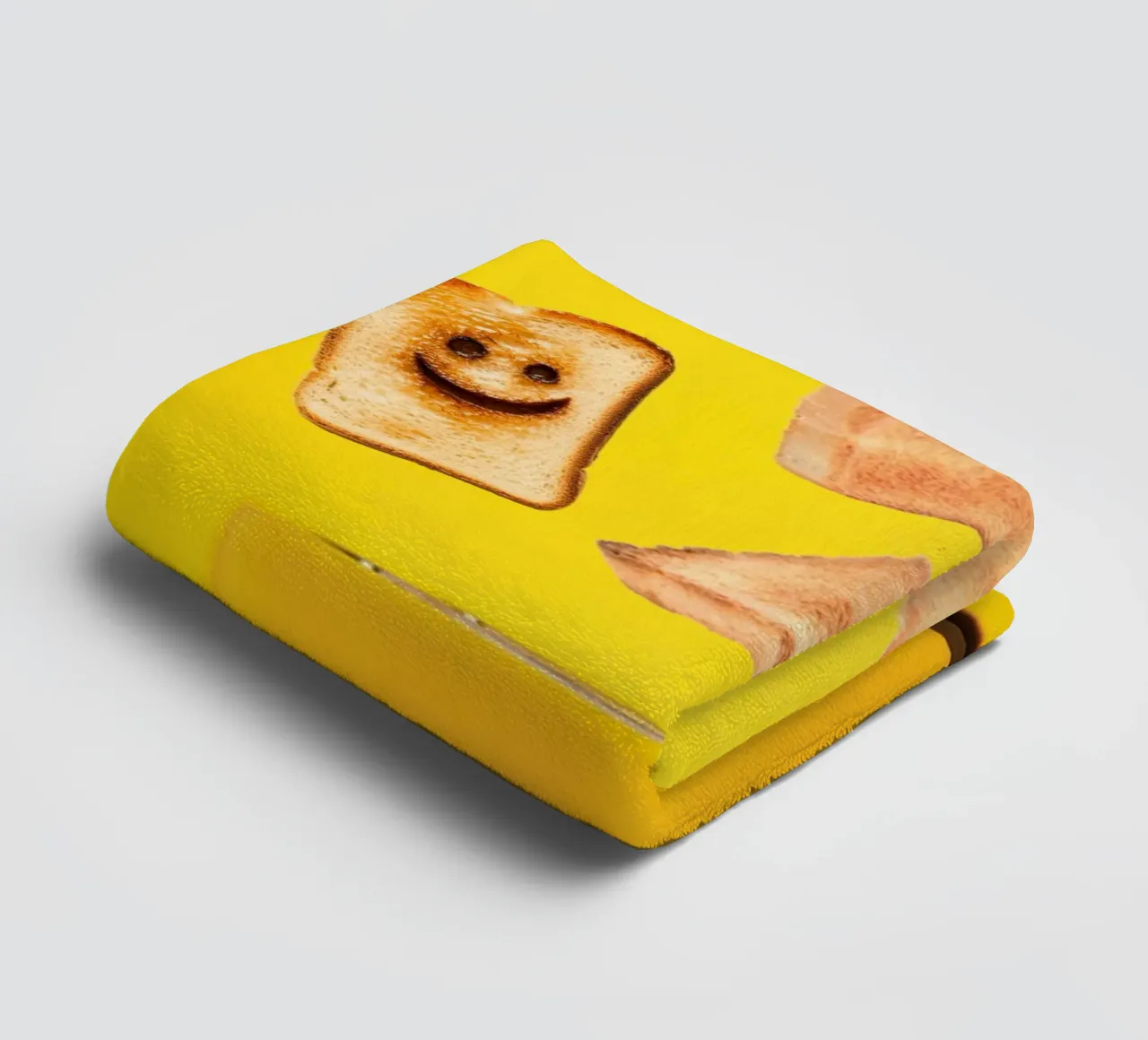Slices of toasted bread with smiling faces towel by ramosashop