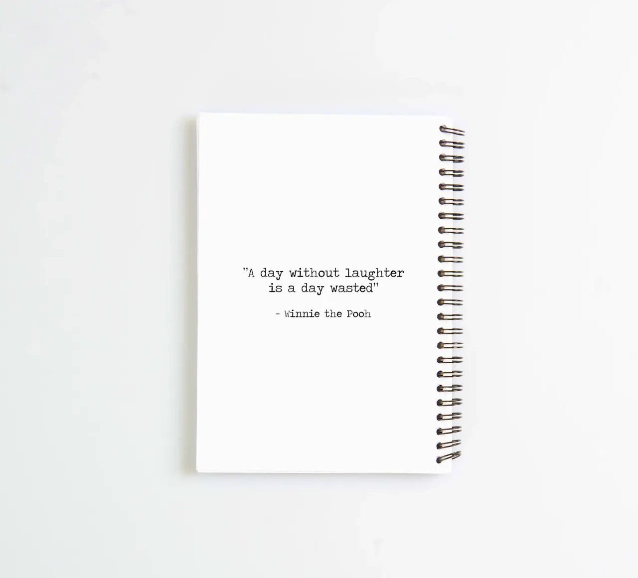 A day without laughter is a day wasted Winnie The Pooh quote spiral notebook by Summer Soul Co. - Quotes