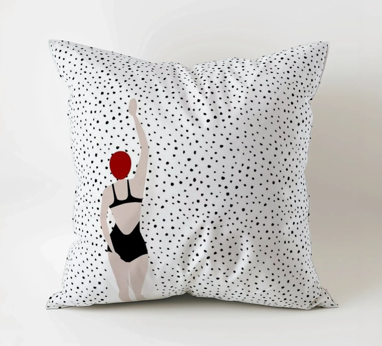 Punktschwimmer decorative cushion by Amy & Kurt