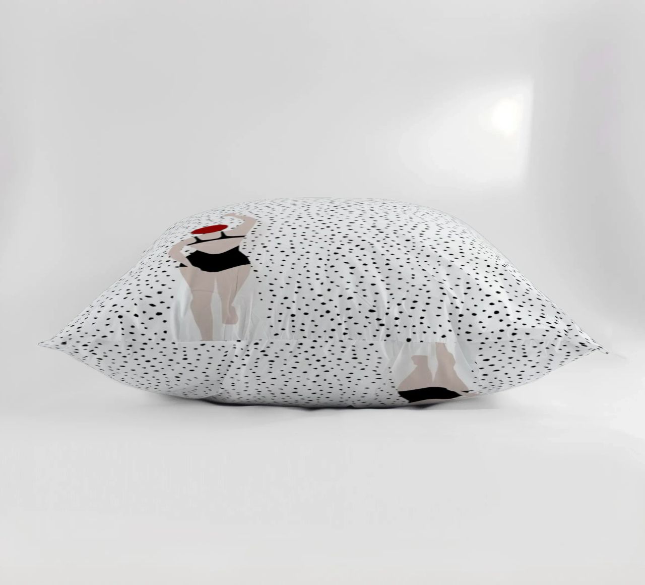Punktschwimmer decorative cushion by Amy & Kurt