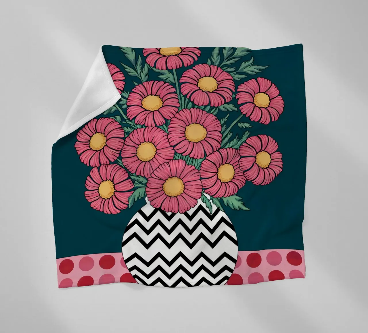 Margherite rosa in un vaso a zig zag coperta in pile da logic