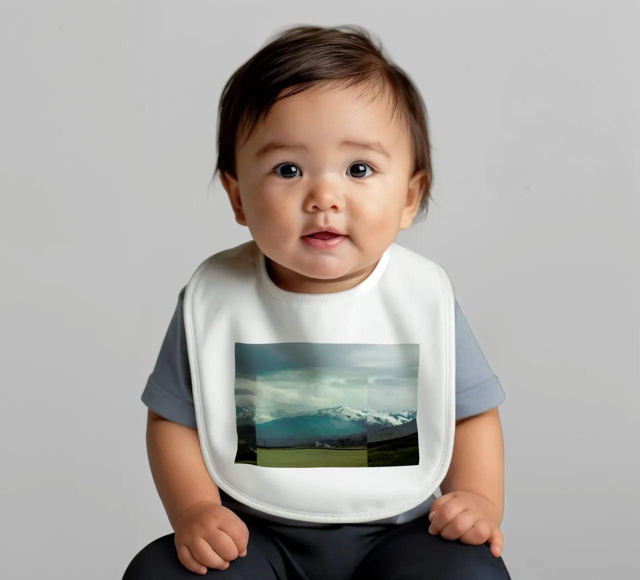 A broken frame baby bib by Nicolas Messaritis