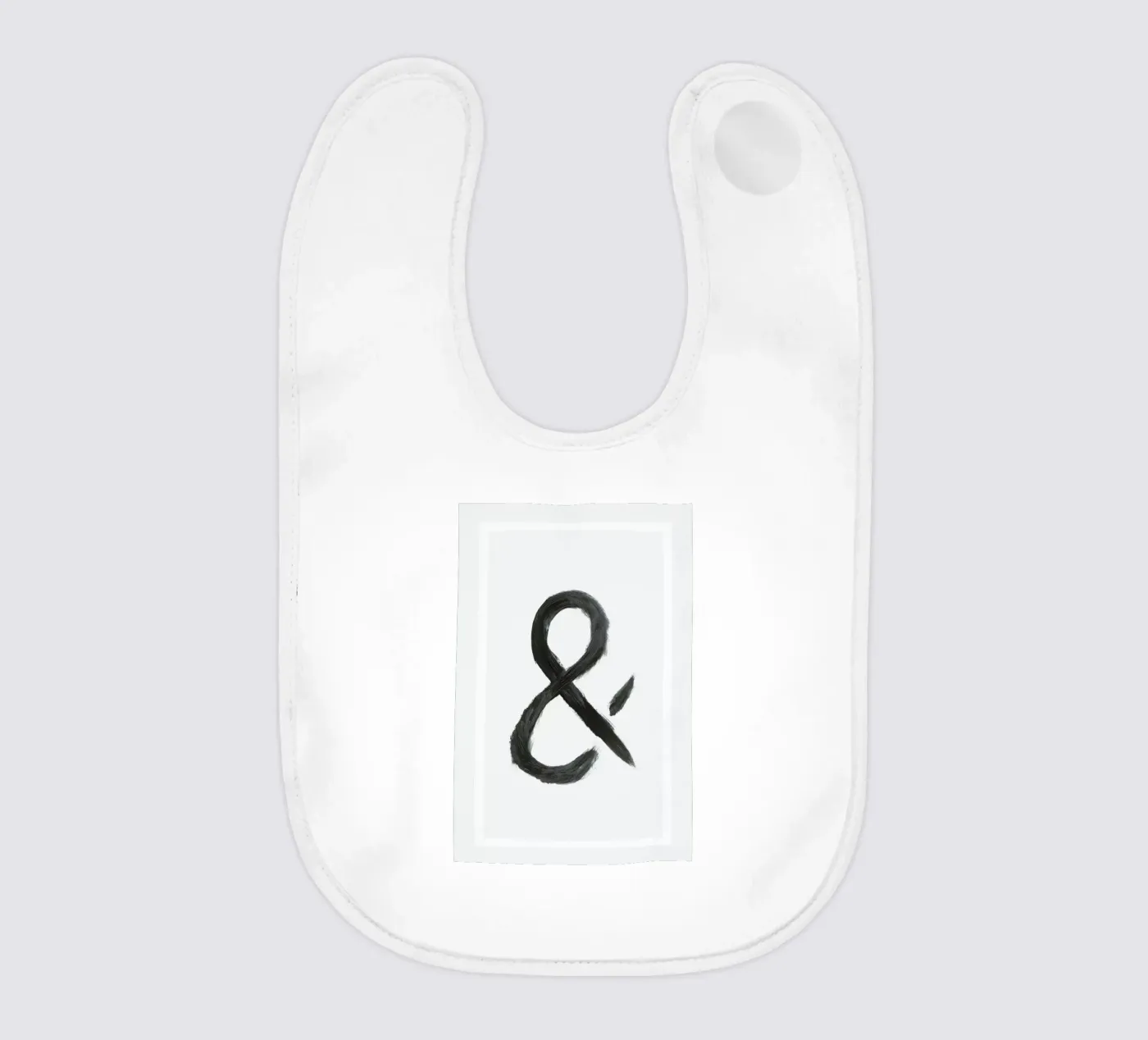 Ampersand baby bib by Bryon S. White