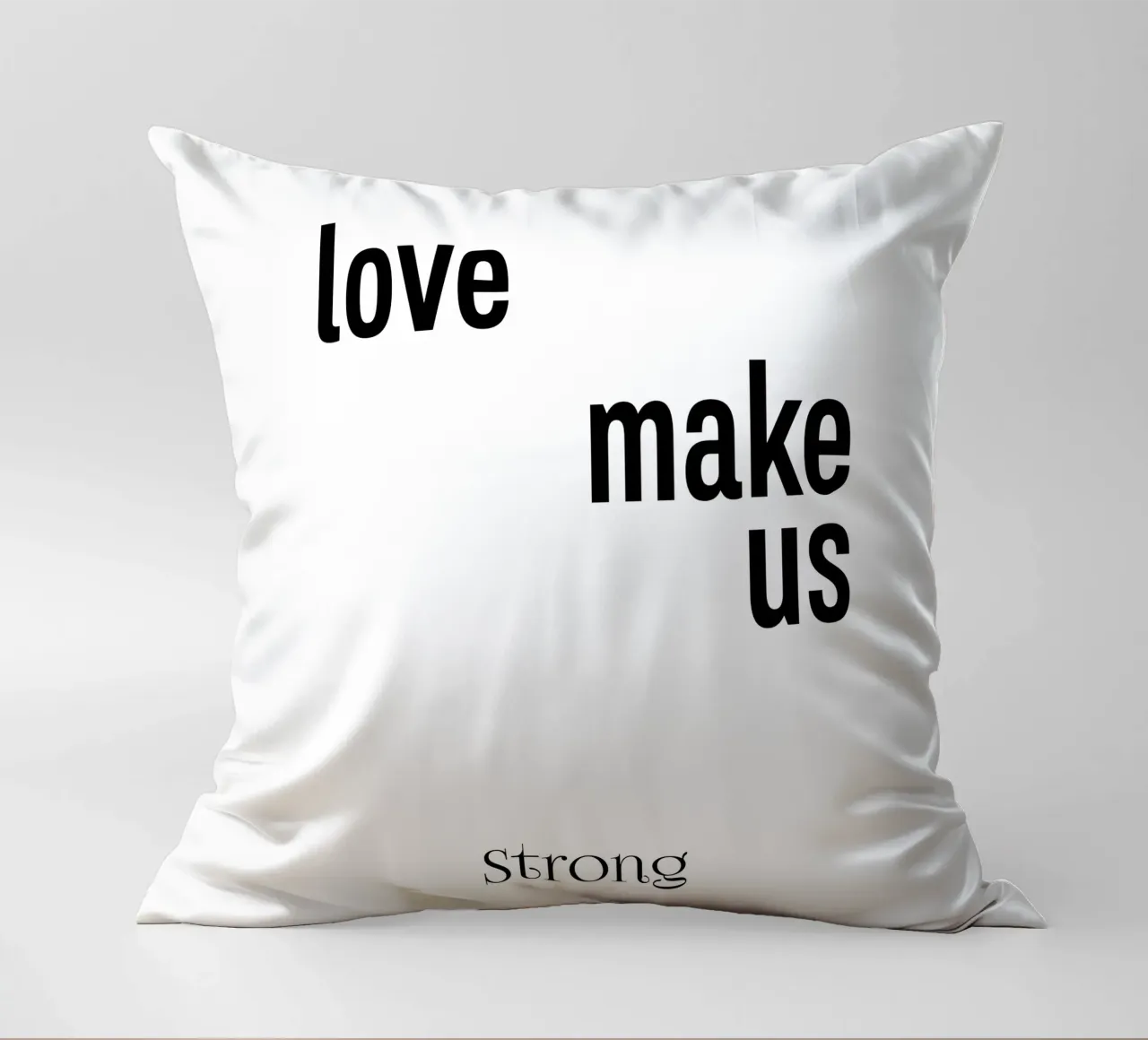 L'amore ci rende forti Tipografia cuscino da YV TYPOGRAPHY