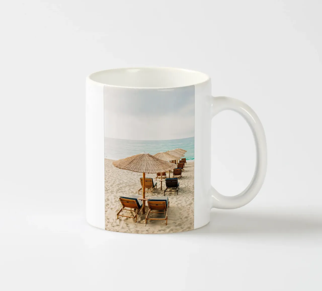 Dream beach in the south with luxurious sun loungers (travel photo) ceramic mug by Bold and Retro