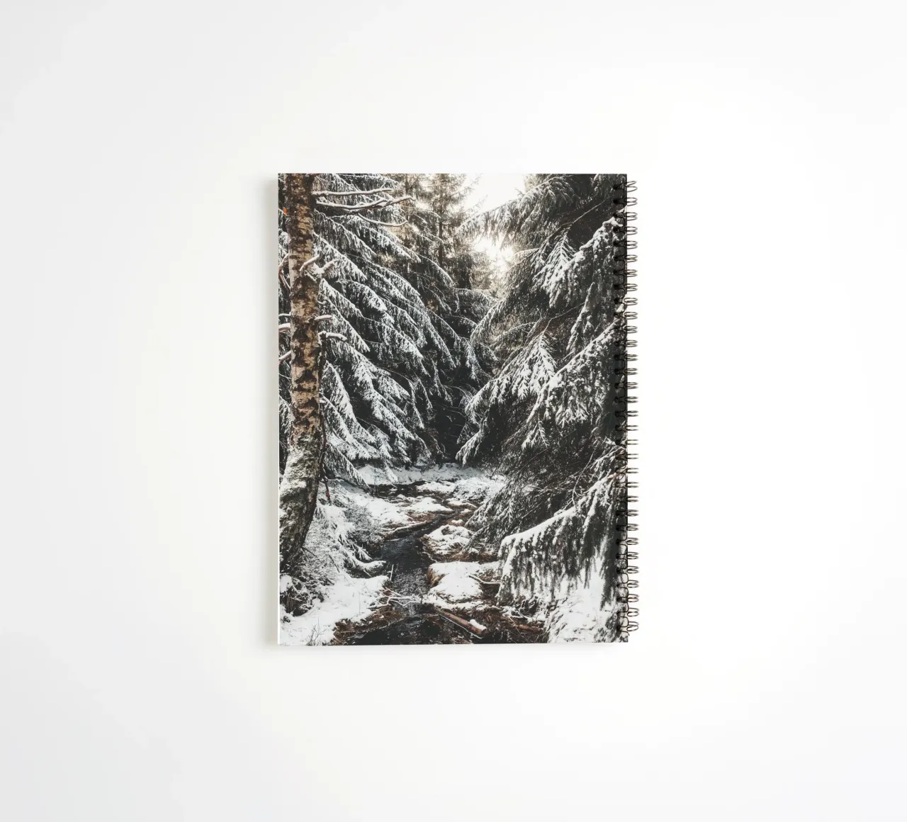 Enchanting winter forest with stream and snow-covered trees spiral notebook by Bold and Retro