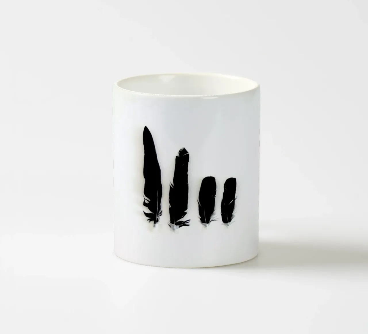 Black Feathers tazza in ceramica da Miles of Light