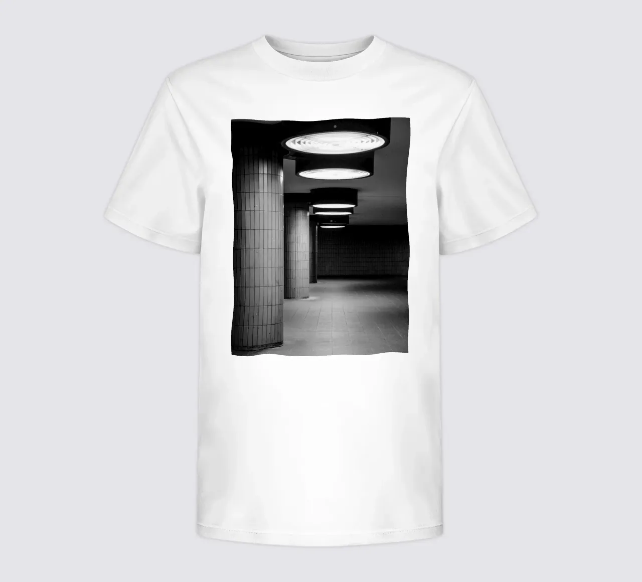 Black and white photo Berlin: Shadow play in a dark tunnel kids t-shirt by Bold and Retro