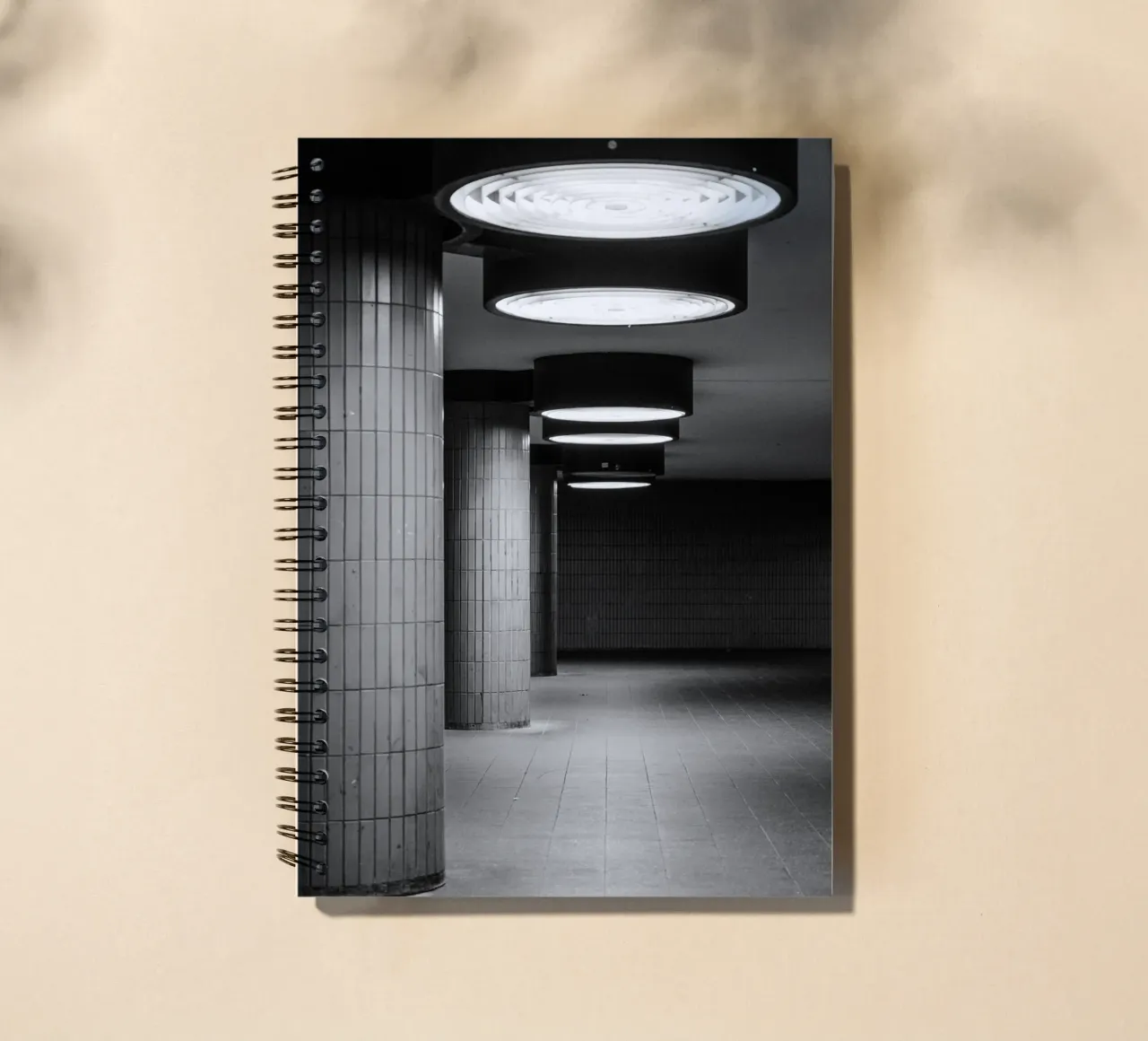 Black and white photo Berlin: Shadow play in a dark tunnel spiral notebook by Bold and Retro