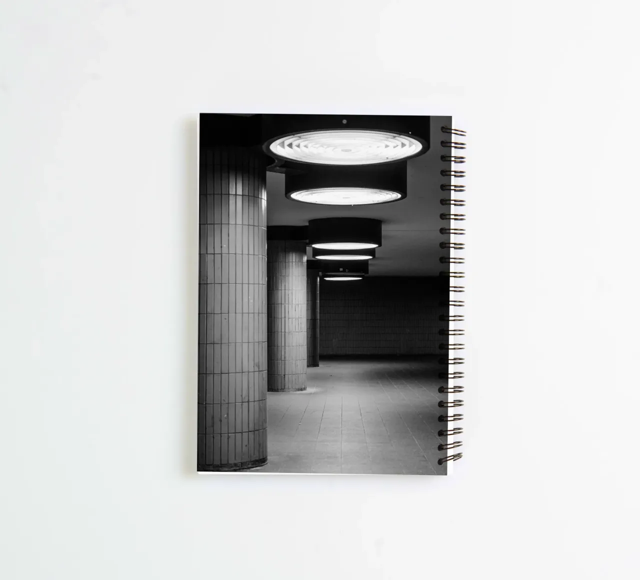 Black and white photo Berlin: Shadow play in a dark tunnel spiral notebook by Bold and Retro
