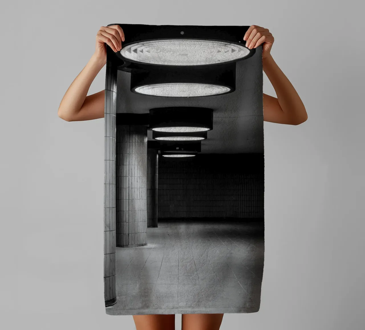 Black and white photo Berlin: Shadow play in a dark tunnel towel by Bold and Retro