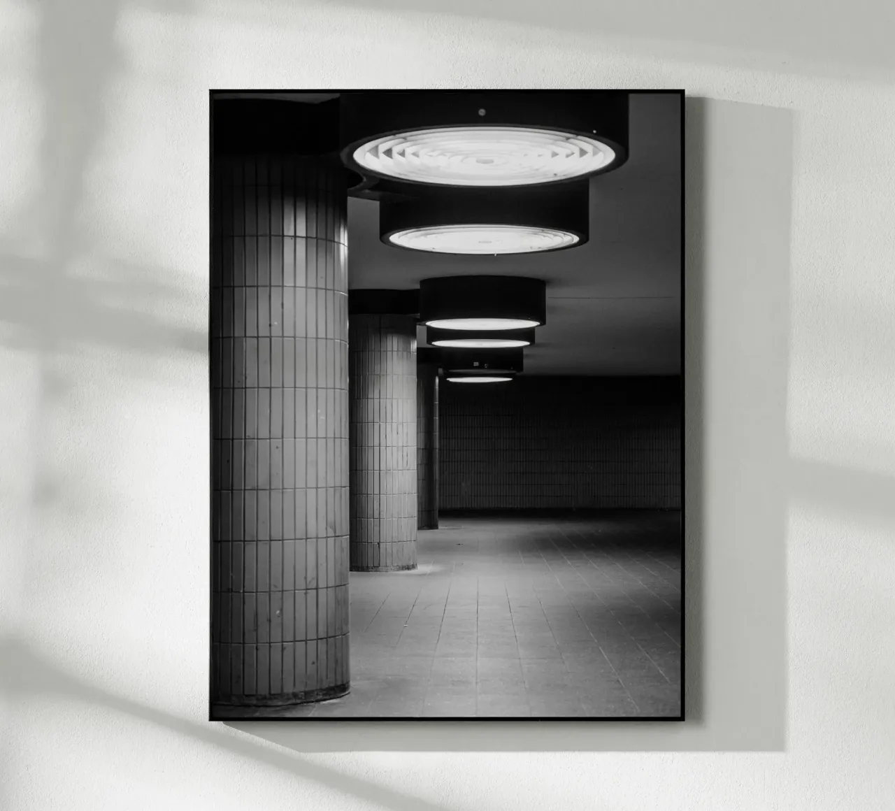 Black and white photo Berlin: Shadow play in a dark tunnel acrylic glass by Bold and Retro