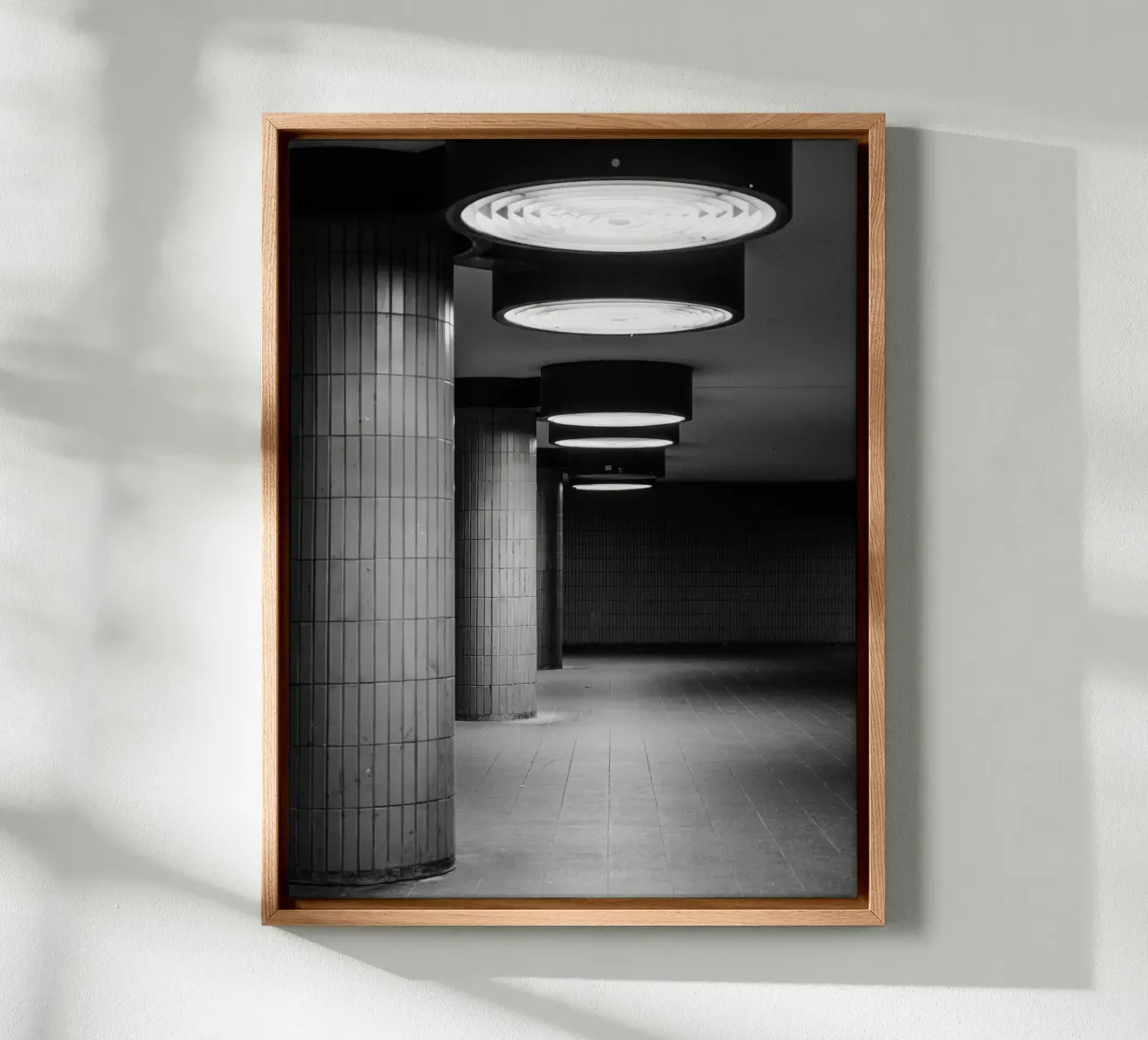 Black and white photo Berlin: Shadow play in a dark tunnel canvas by Bold and Retro