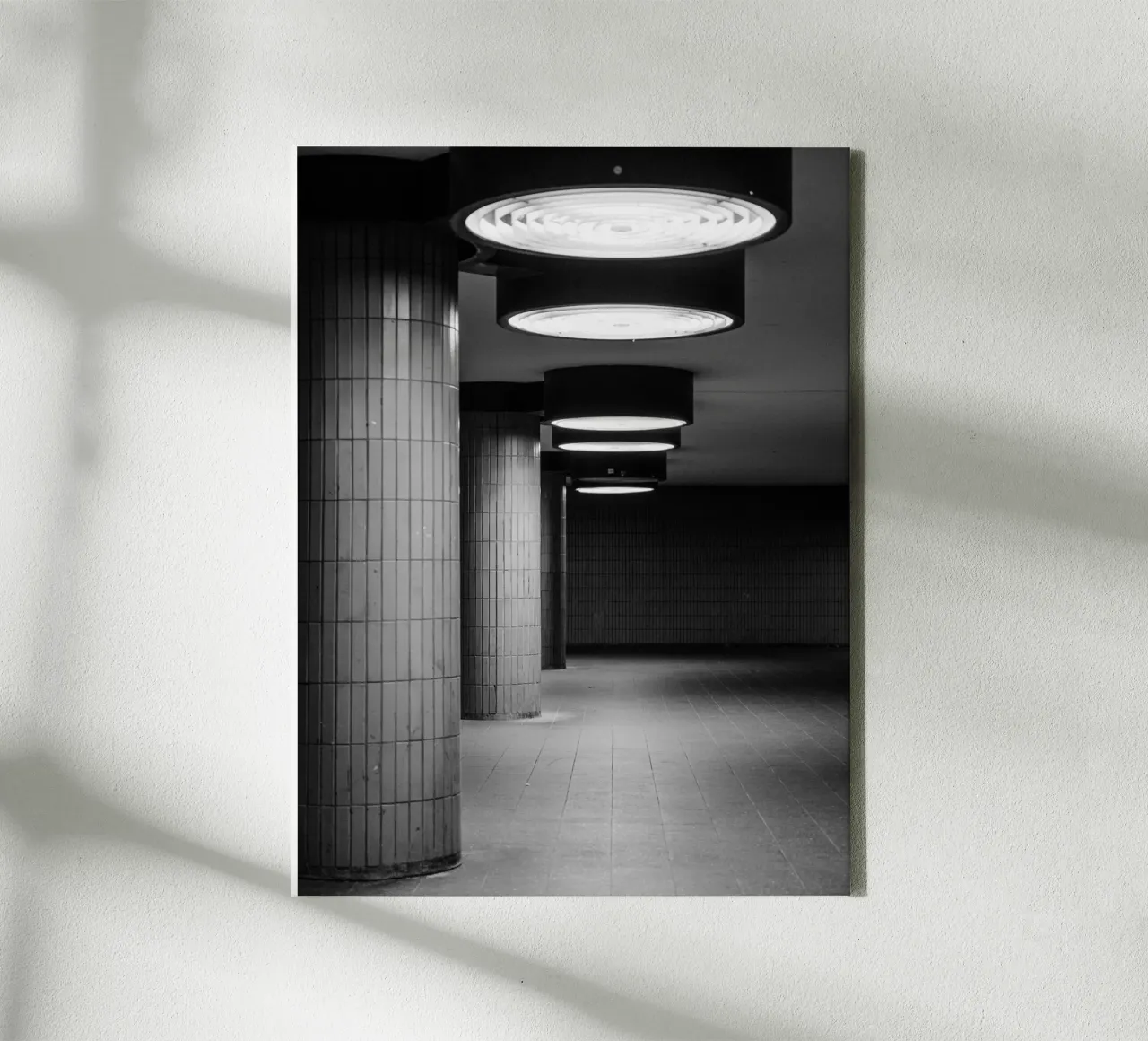 Black and white photo Berlin: Shadow play in a dark tunnel canvas by Bold and Retro