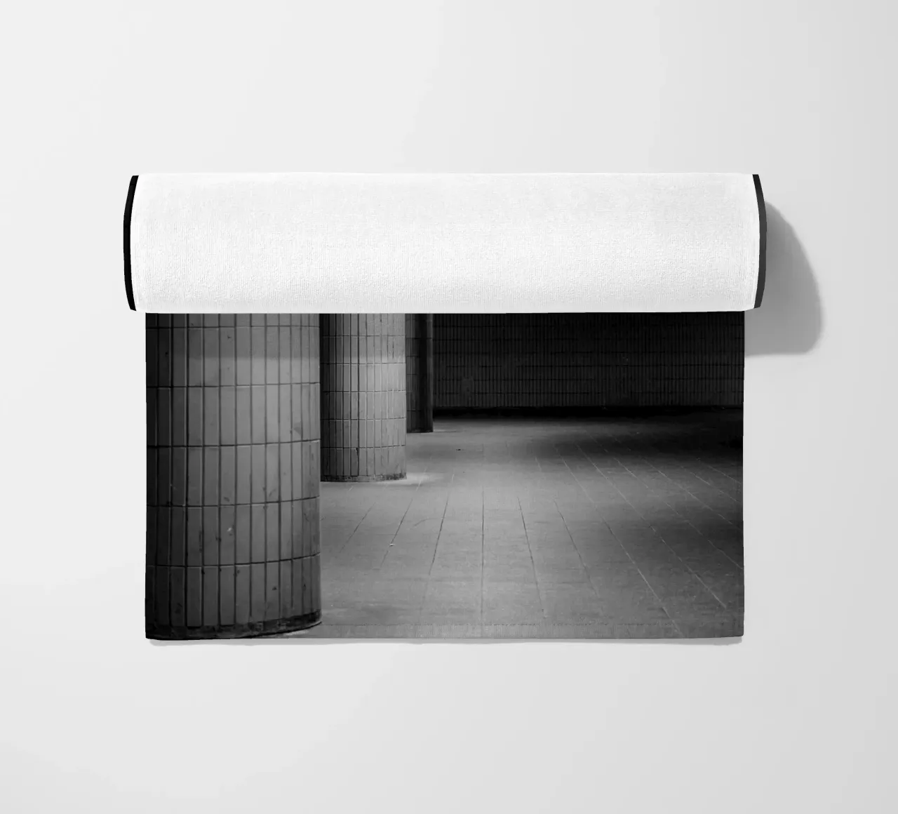 Black and white photo Berlin: Shadow play in a dark tunnel beach towel by Bold and Retro