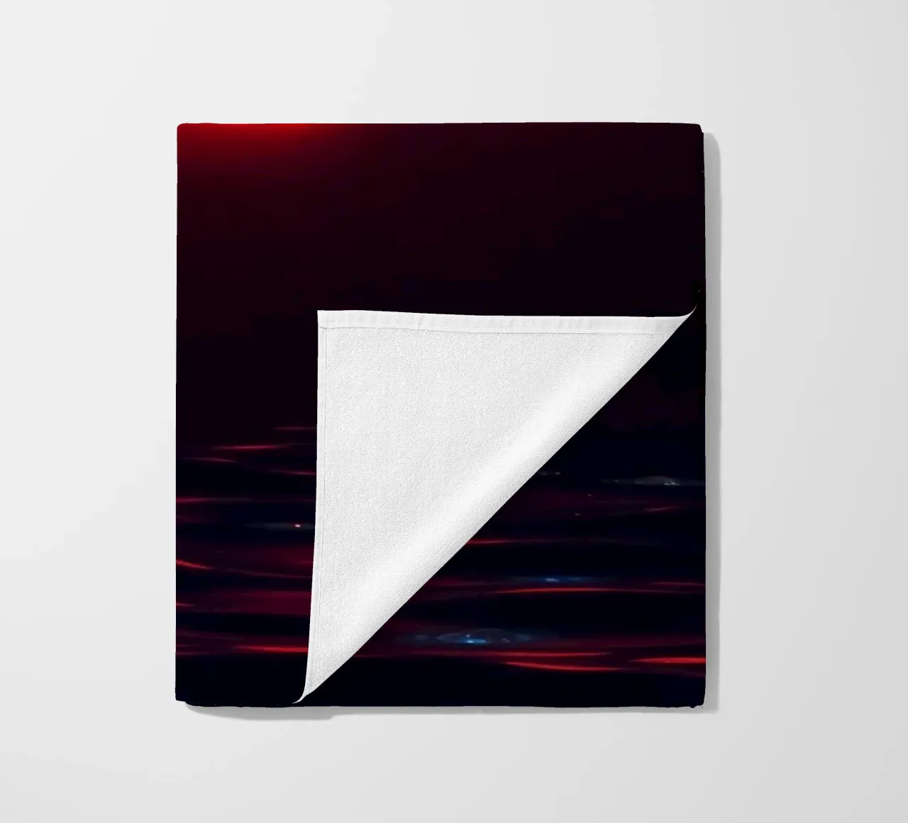 Moon reflects on dark water during a celestial event beach towel by DesignDoodle