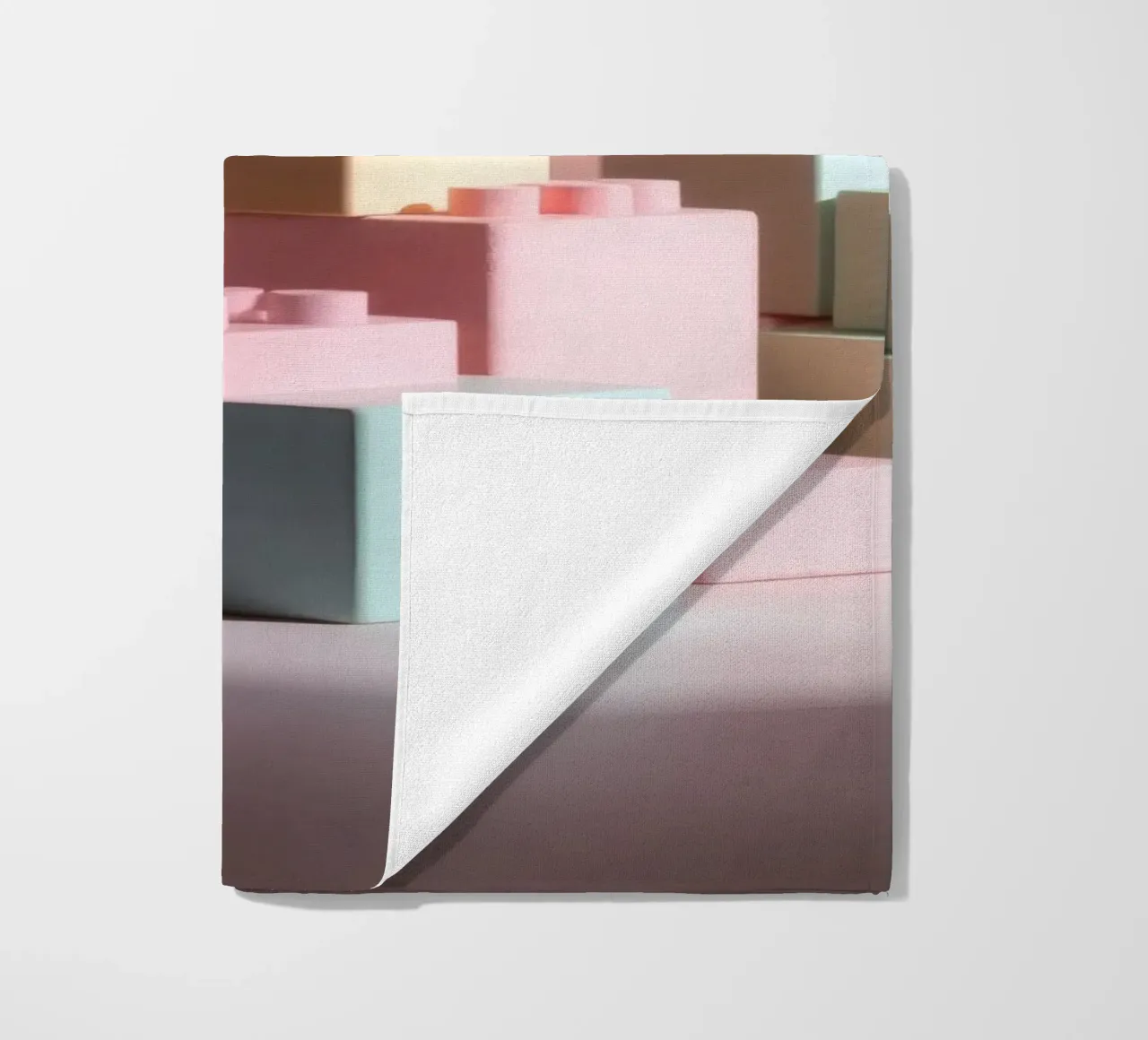 Colorful building blocks arranged in a playful geometric beach towel by DesignDoodle