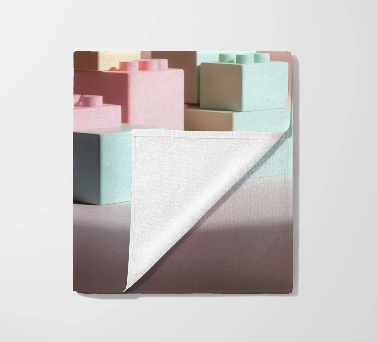 Colorful building blocks arranged in a playful geometric beach towel by DesignDoodle