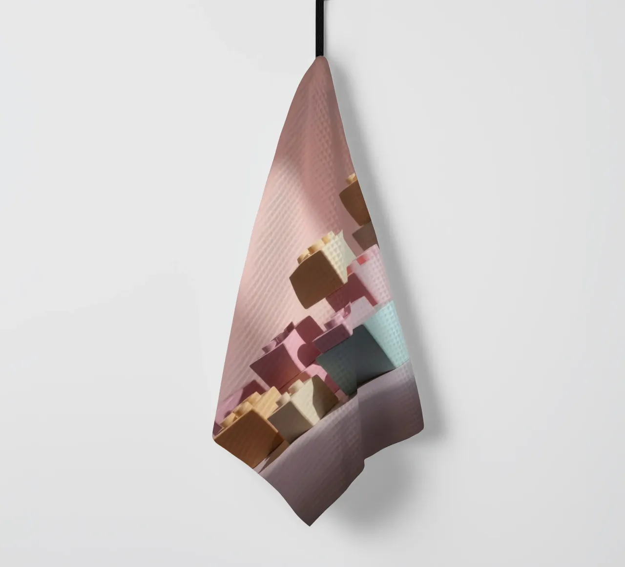 Colorful building blocks arranged in a playful geometric tea towel by DesignDoodle