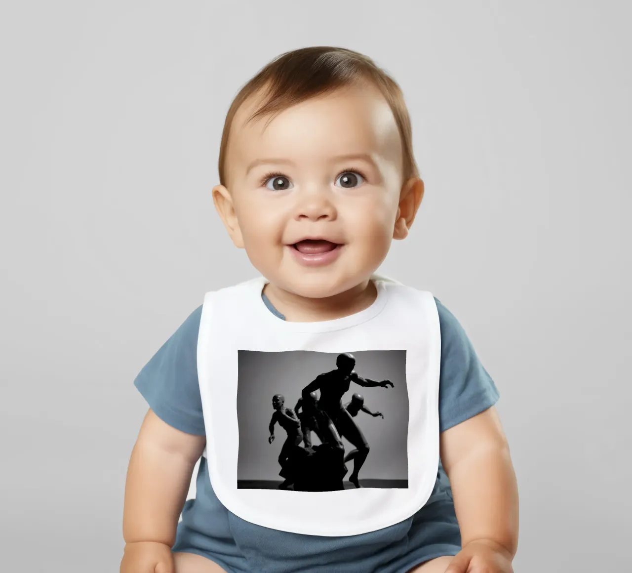 Figures in motion capturing the essence of struggle baby bib by DesignDoodle