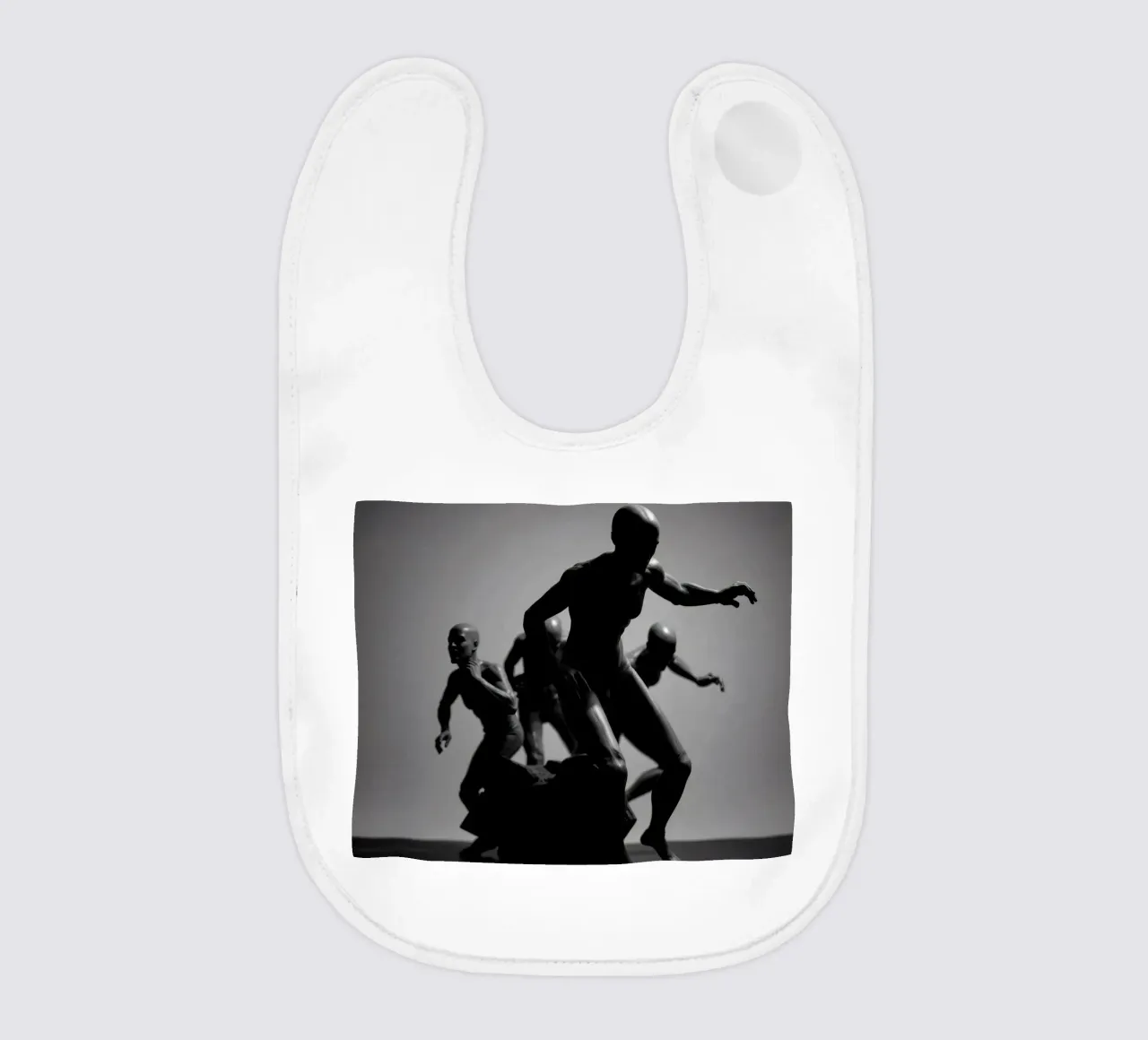 Figures in motion capturing the essence of struggle baby bib by DesignDoodle