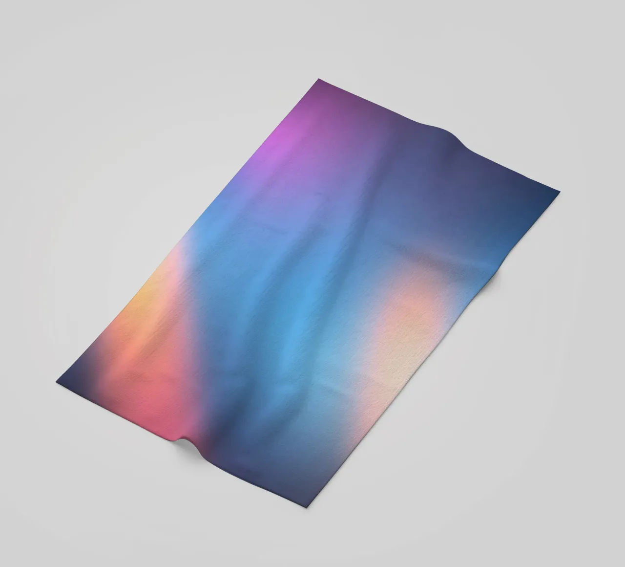 Colorful light gradients create an abstract backdrop beach towel by DesignDoodle