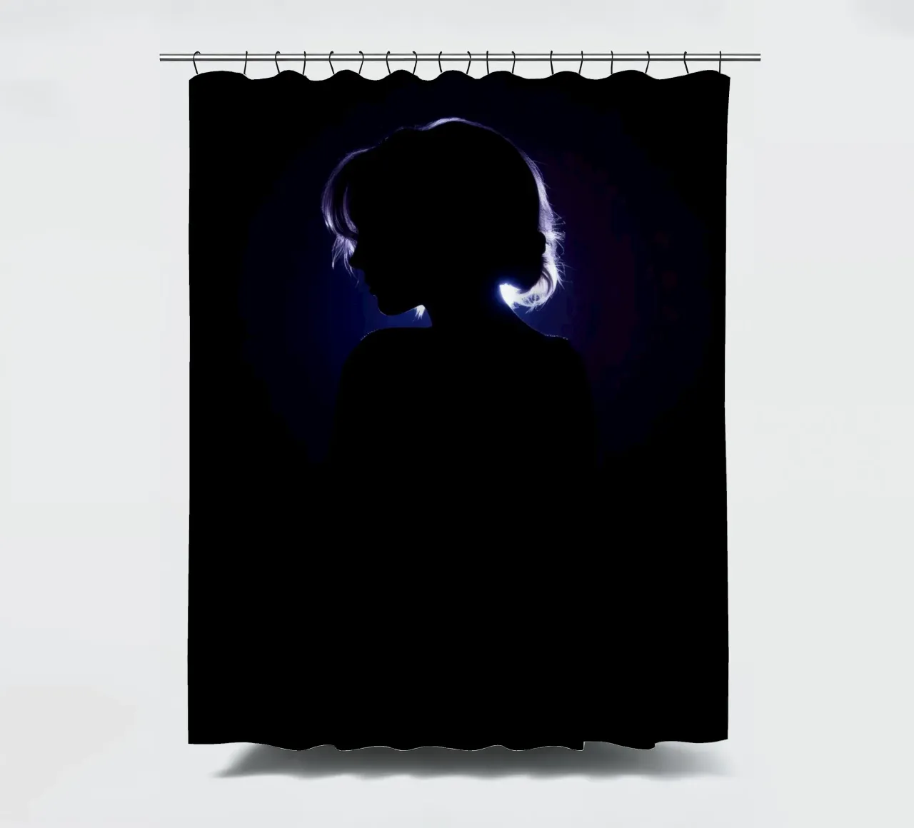 Silhouette of a child against a dark background illuminated shower curtain by DesignDoodle