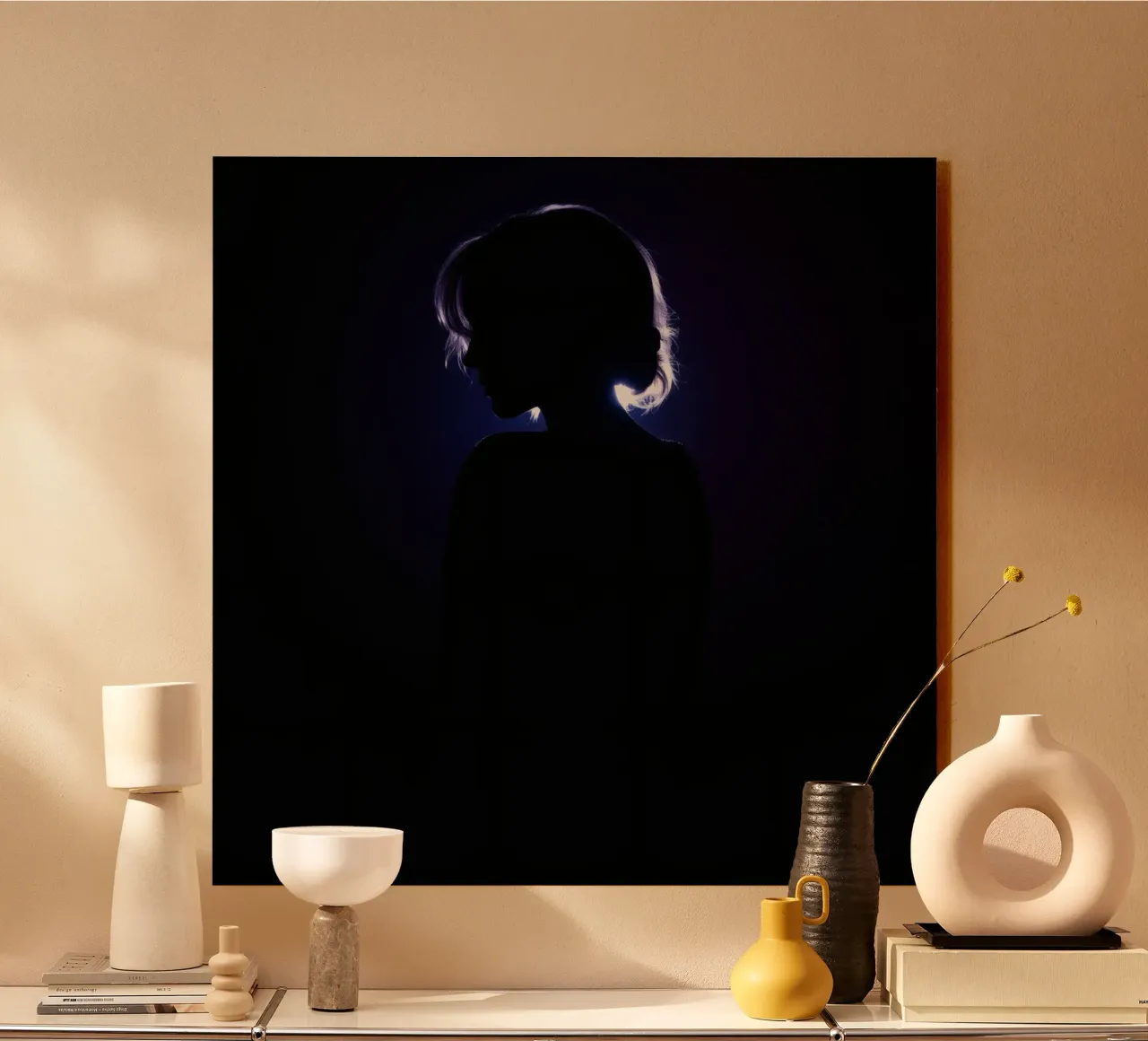 Silhouette of a child against a dark background illuminated alu-dibond by DesignDoodle
