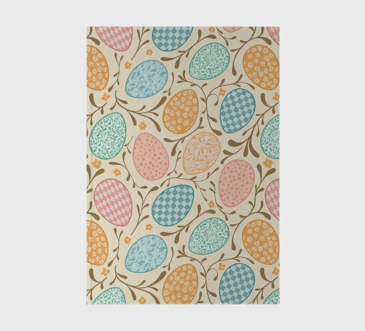 Whimsical Easter Eggs with Floral and Checkered Patterns notebook by CoelfenArt