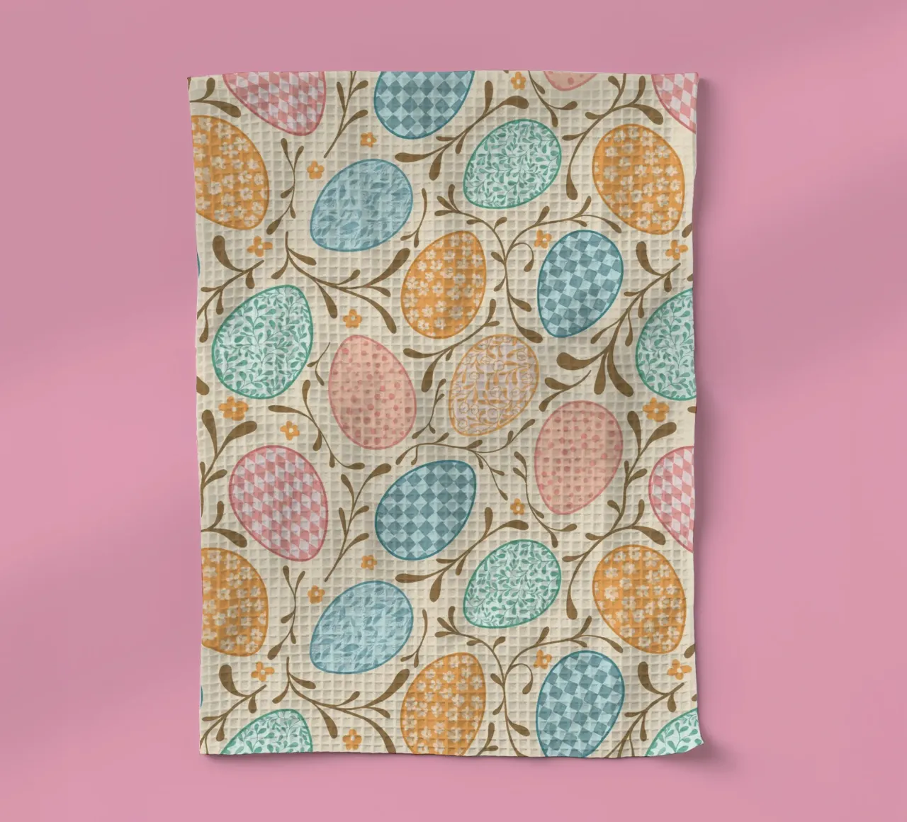Whimsical Easter Eggs with Floral and Checkered Patterns tea towel by CoelfenArt