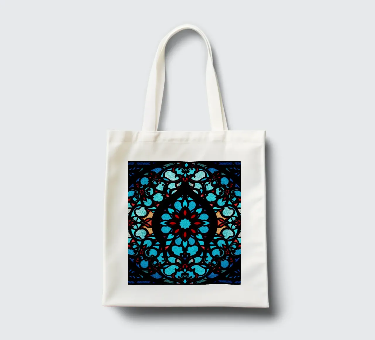 Colorful stained glass artwork featuring intricate floral tote bag by DesignDoodle
