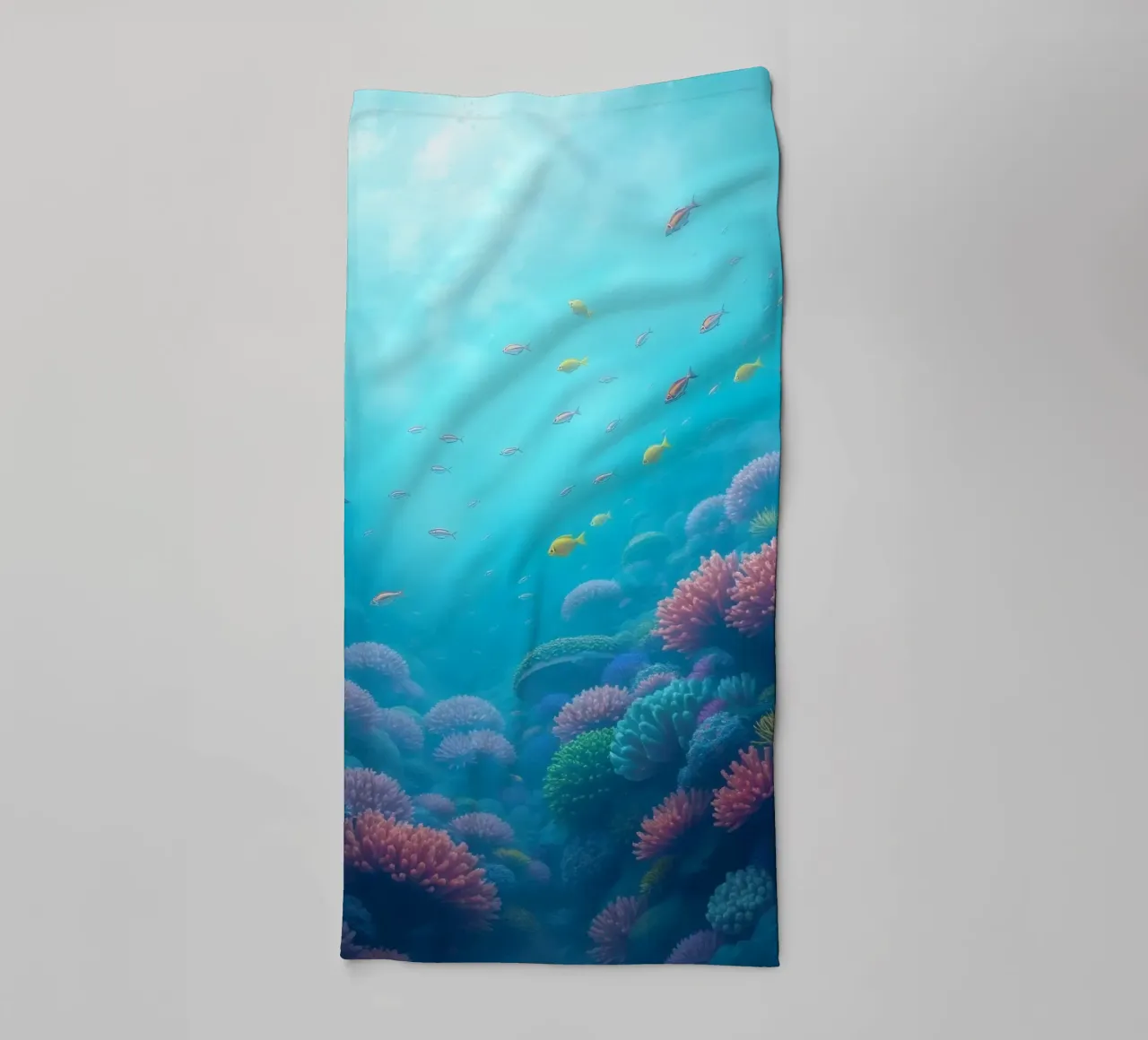 Vibrant underwater coral reef teeming with colorful fish in towel by DesignDoodle
