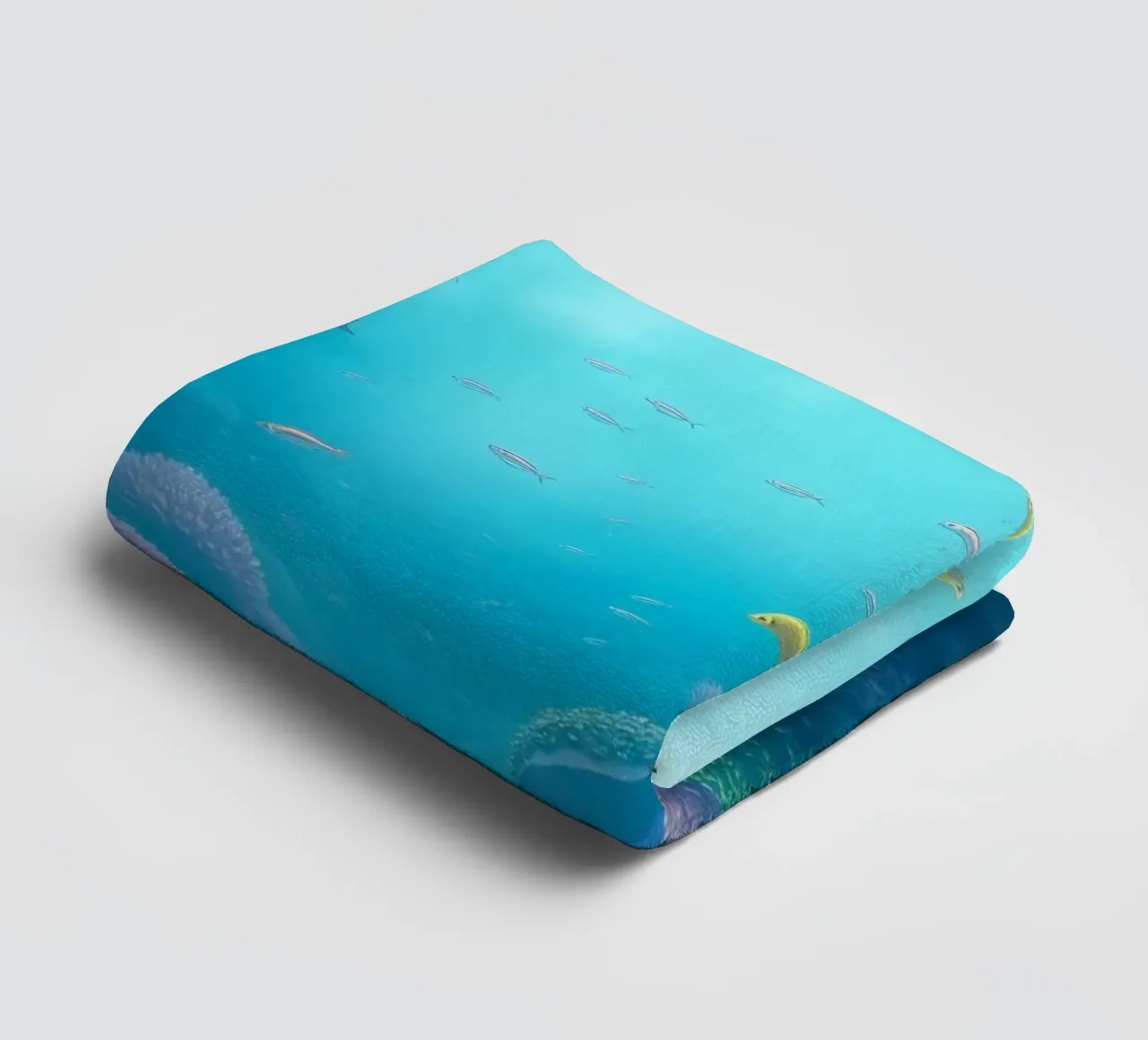 Vibrant underwater coral reef teeming with colorful fish in towel by DesignDoodle