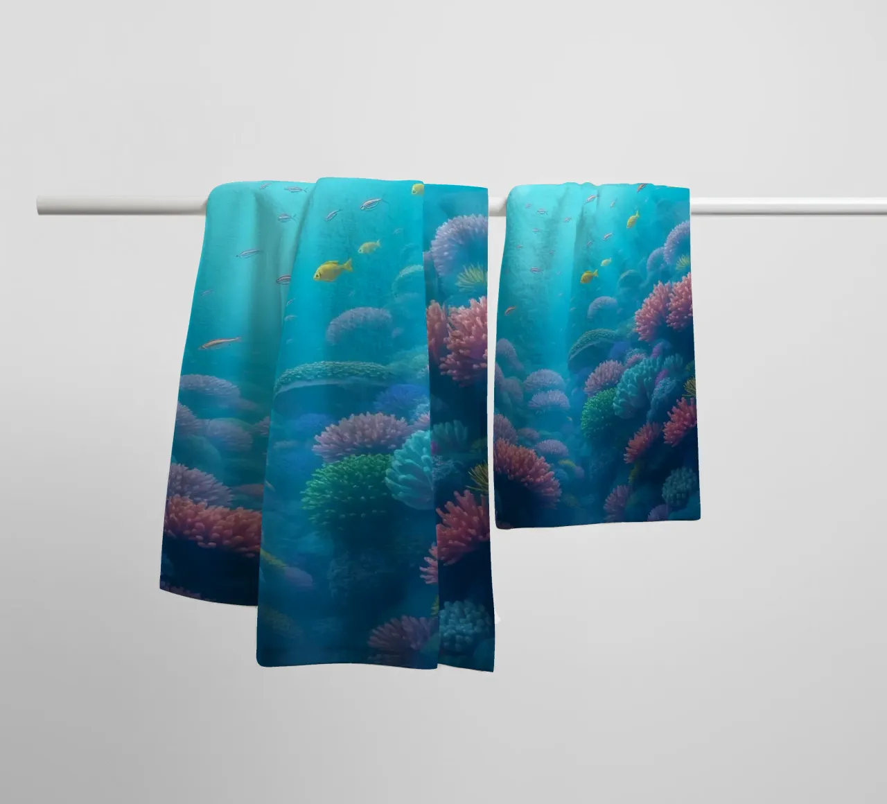 Vibrant underwater coral reef teeming with colorful fish in towel by DesignDoodle