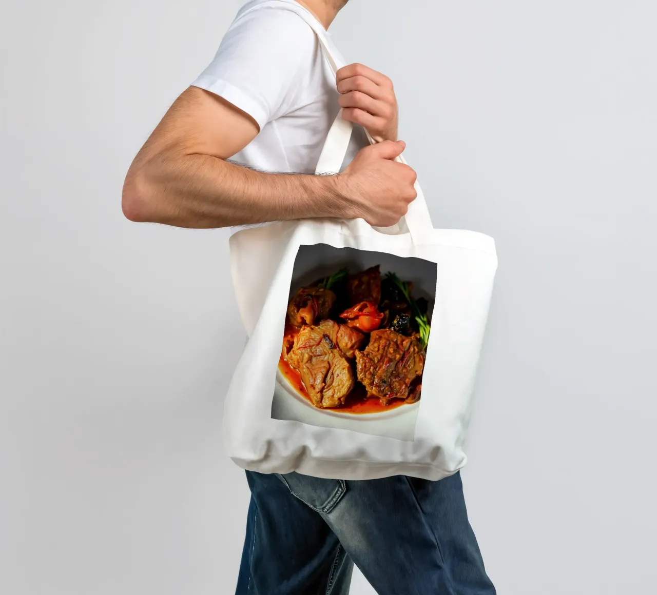 Savory slow-cooked beef stew with herbs and vegetables tote bag by DesignDoodle