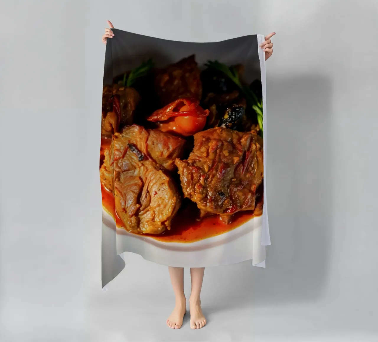 Savory slow-cooked beef stew with herbs and vegetables beach towel by DesignDoodle
