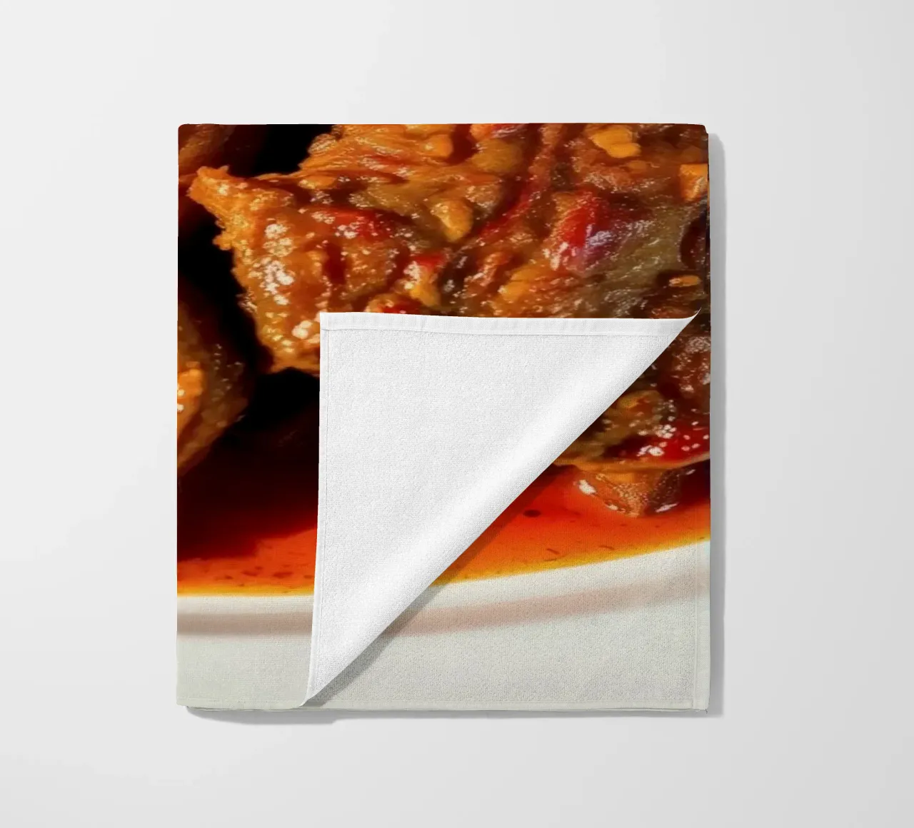 Savory slow-cooked beef stew with herbs and vegetables beach towel by DesignDoodle