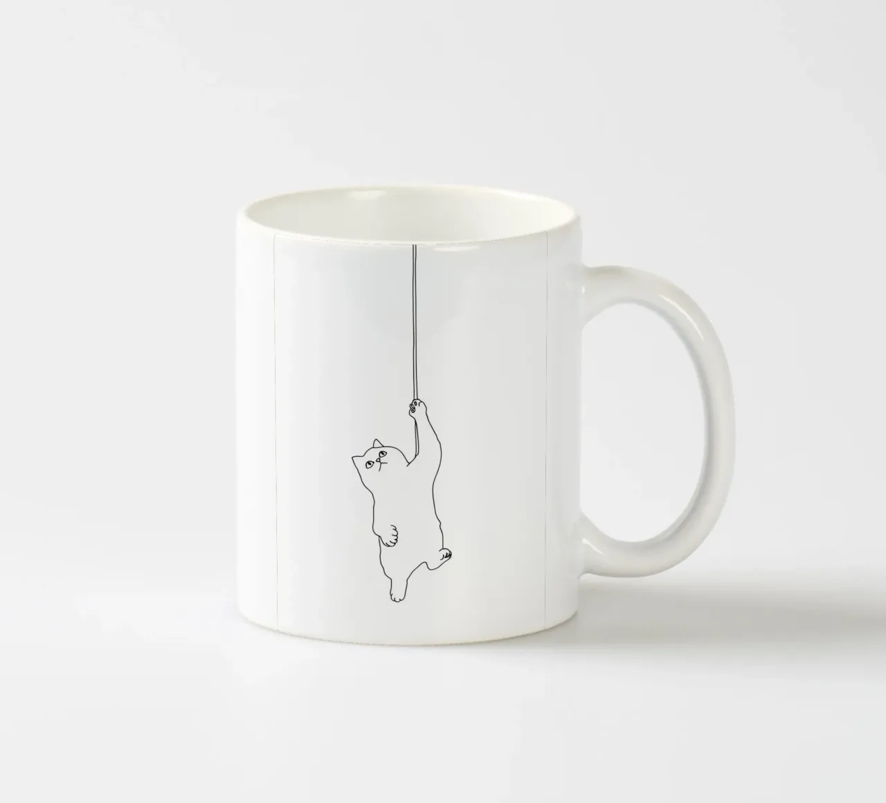 Minimalist Line Drawing of a Cat Hanging on a String | Moder ceramic mug by Viv Line Art