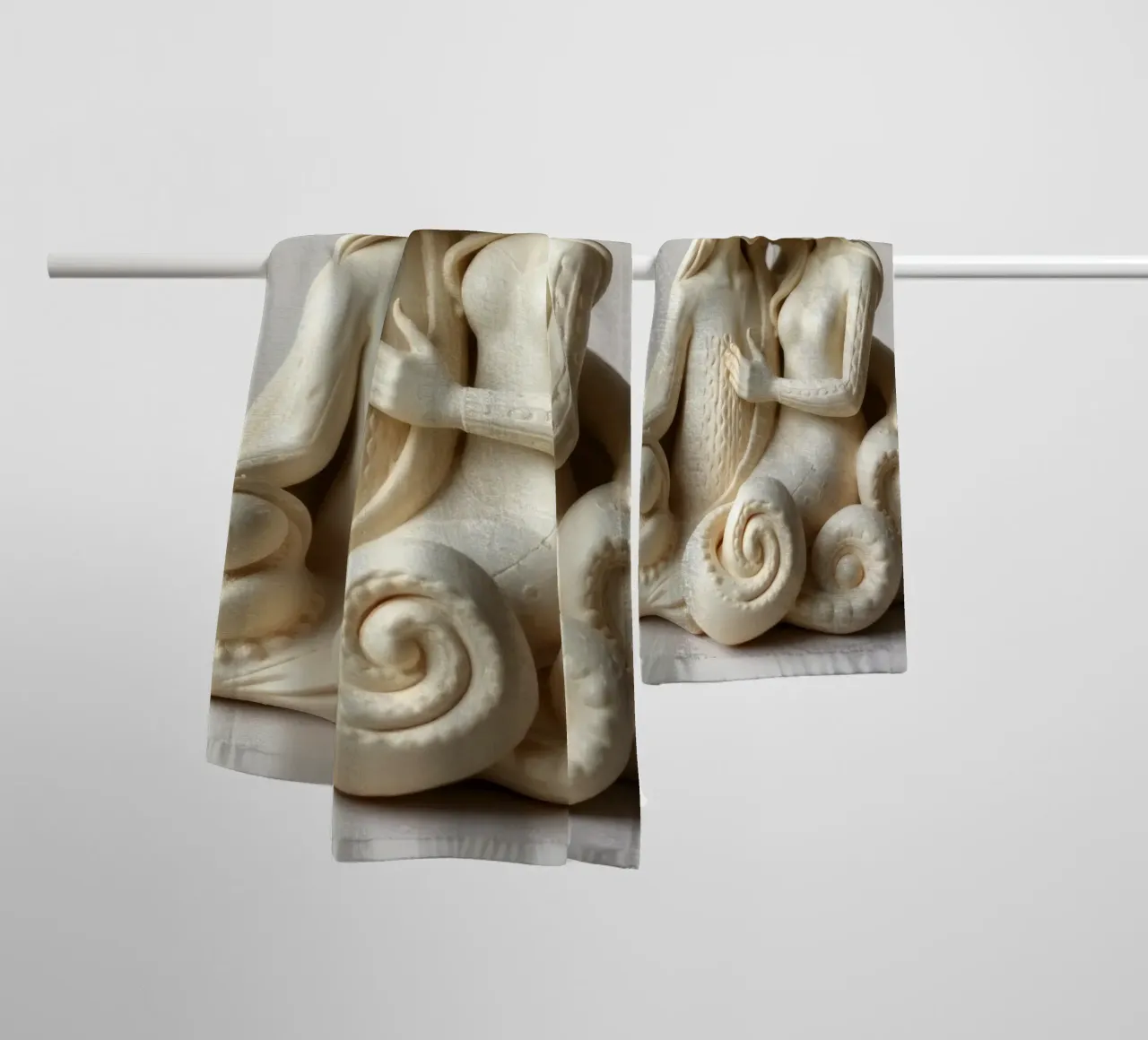 Intricate sculpture depicting two intertwined figures towel by DesignDoodle