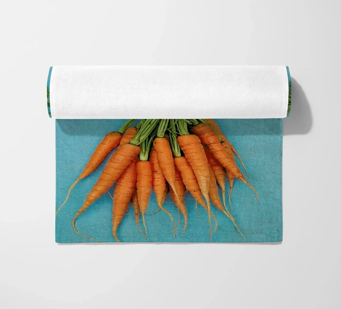 Carrots beach towel by Keri Bevan