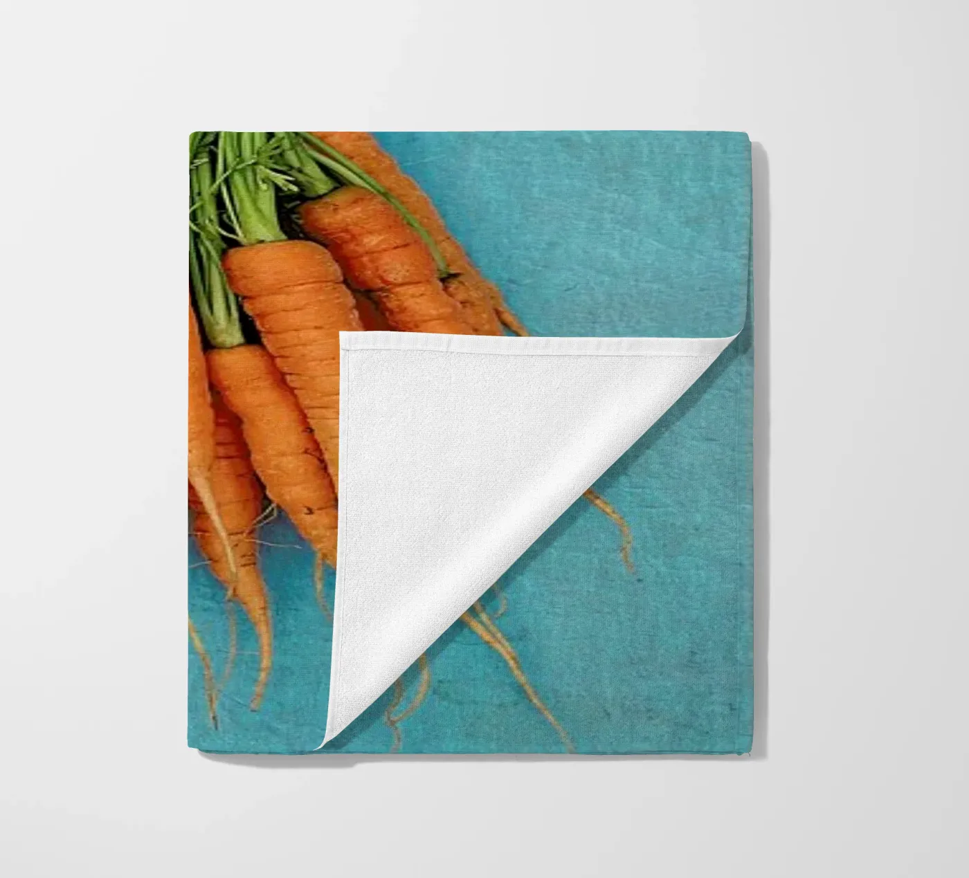 Carrots beach towel by Keri Bevan