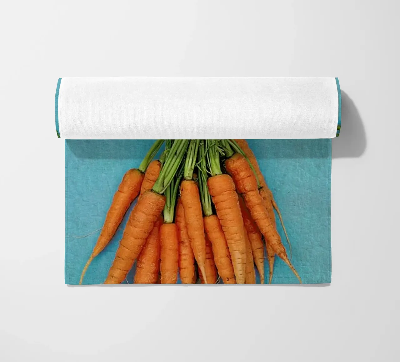 Carrots beach towel by Keri Bevan