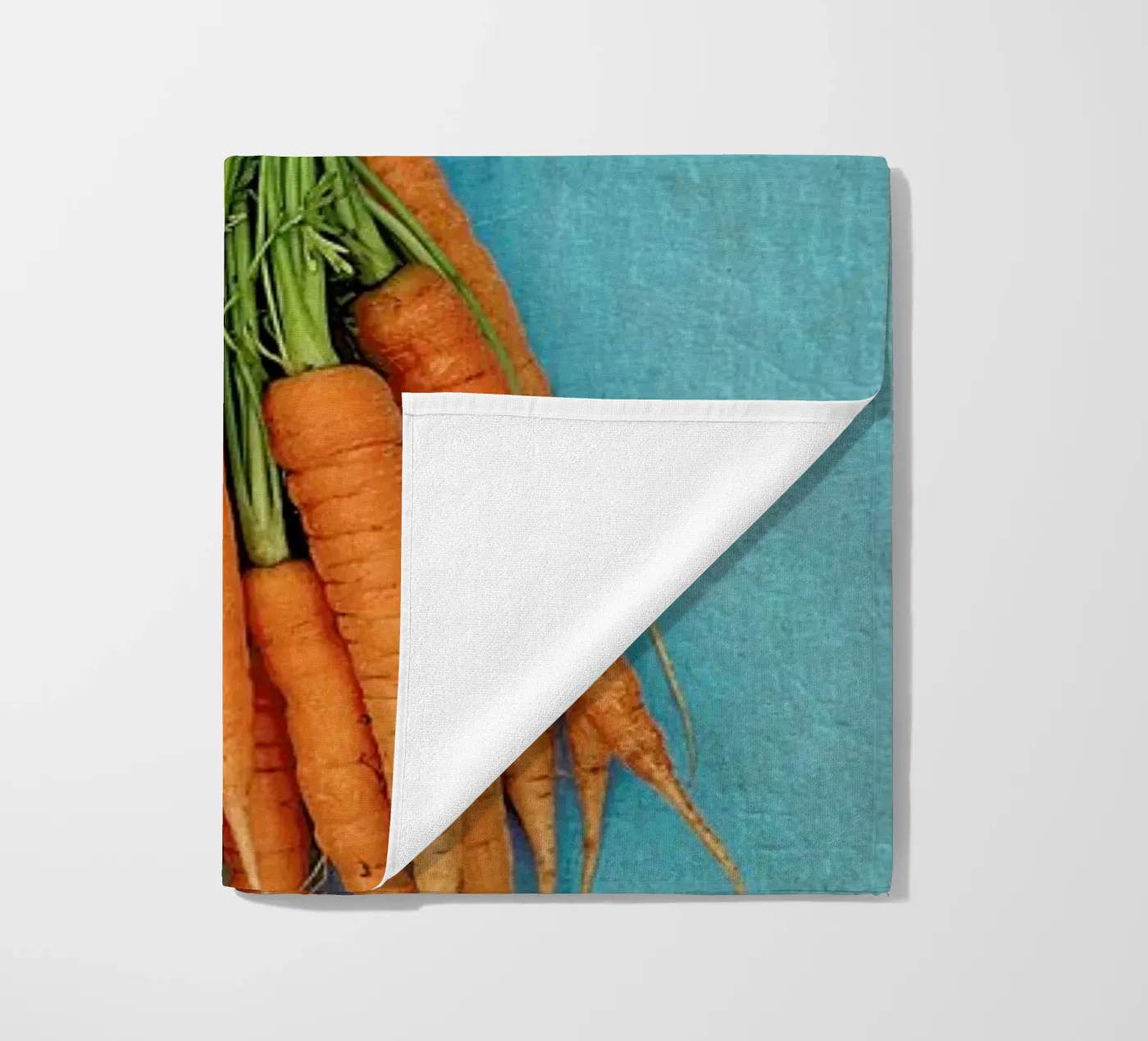 Carrots beach towel by Keri Bevan