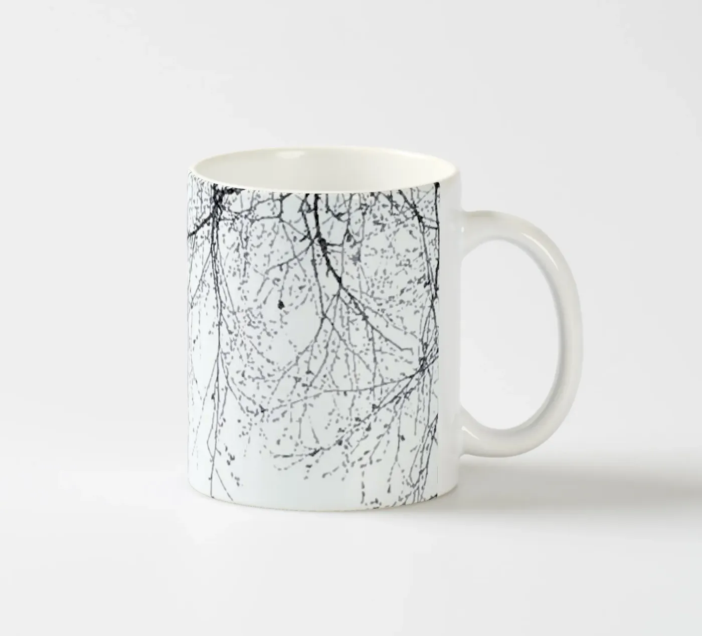 Black Branches ceramic mug by Monika Strigel