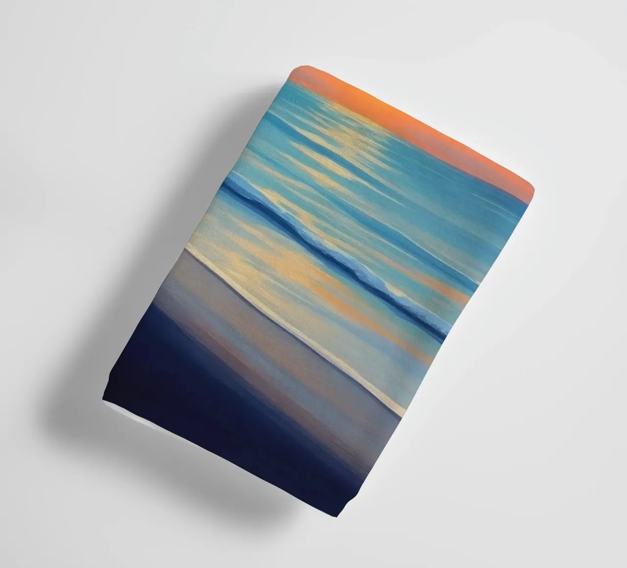 Sunset over the ocean with a lone palm tree on a beach towel by DesignDoodle